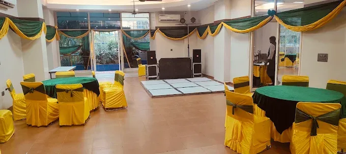 Green and yellow banquet decoration by Shree Balaji Caterers