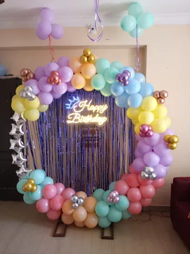 Pastel birthday balloon decoration by Shree Balaji Caterers